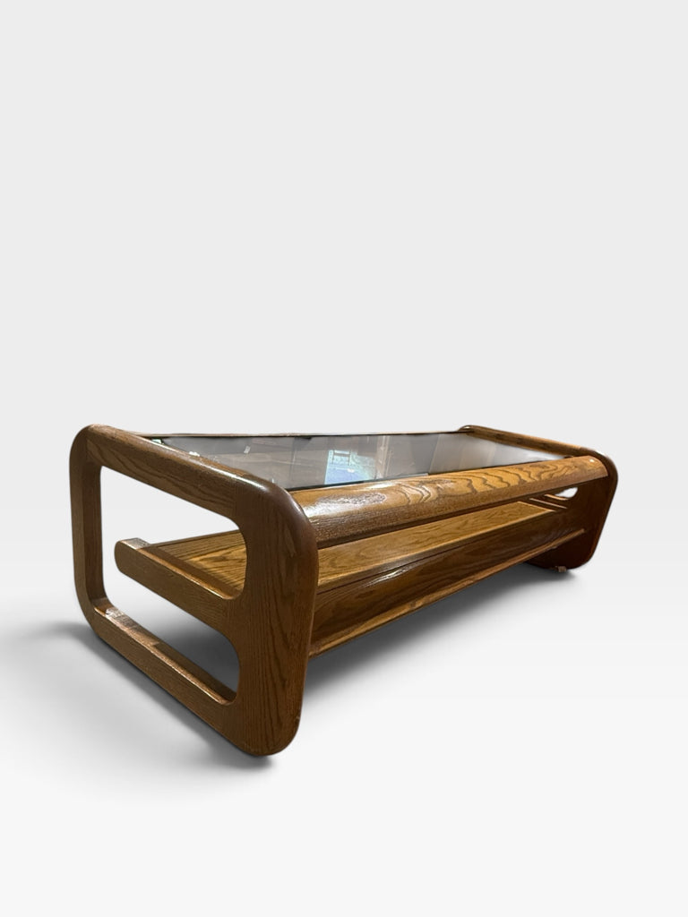 VTG 1970s Modernist coffee table w/sled base, oak/smoked beveled glass