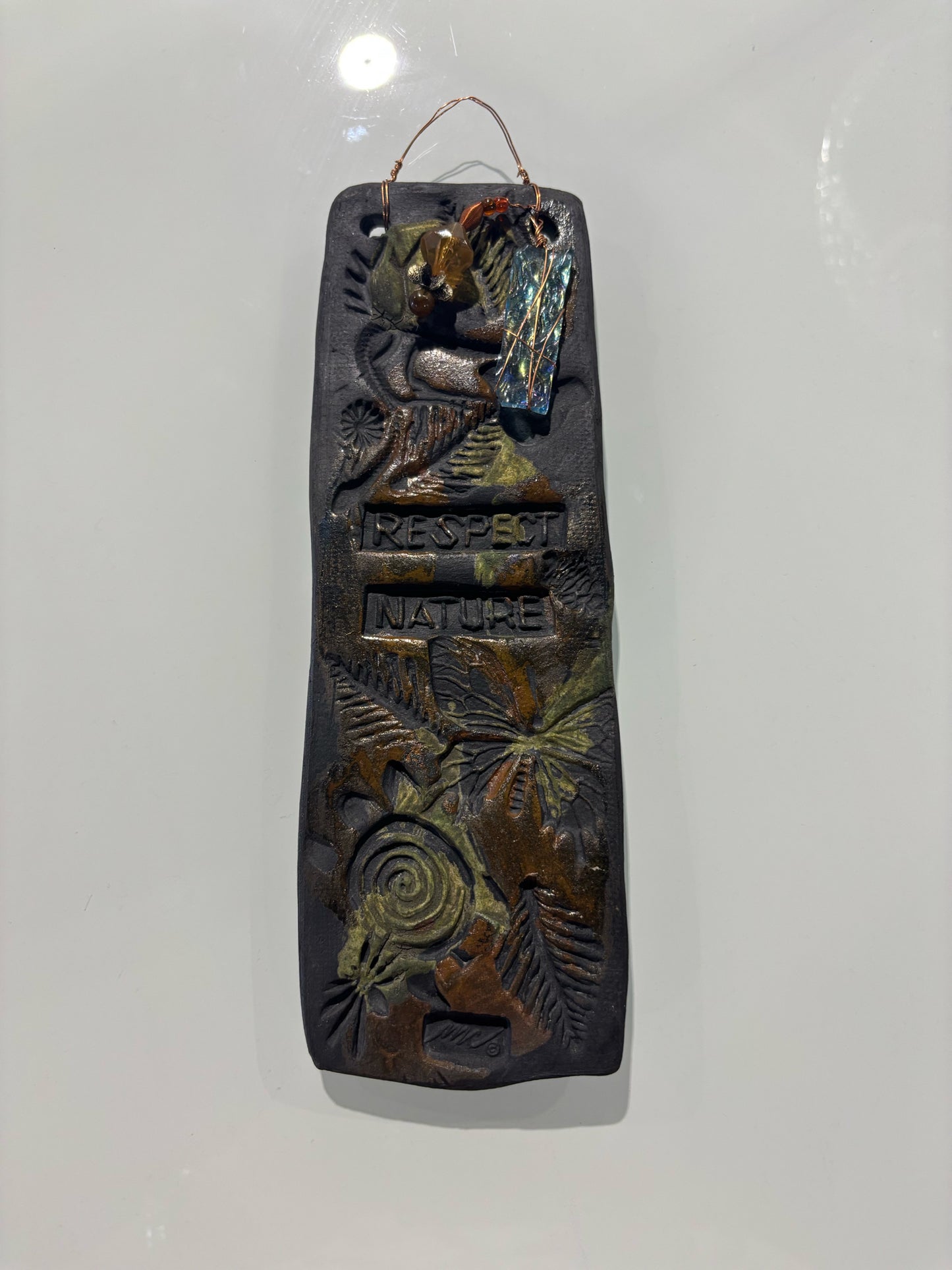 Pottery Wall Hanging 9" L x 3" W x .5" D