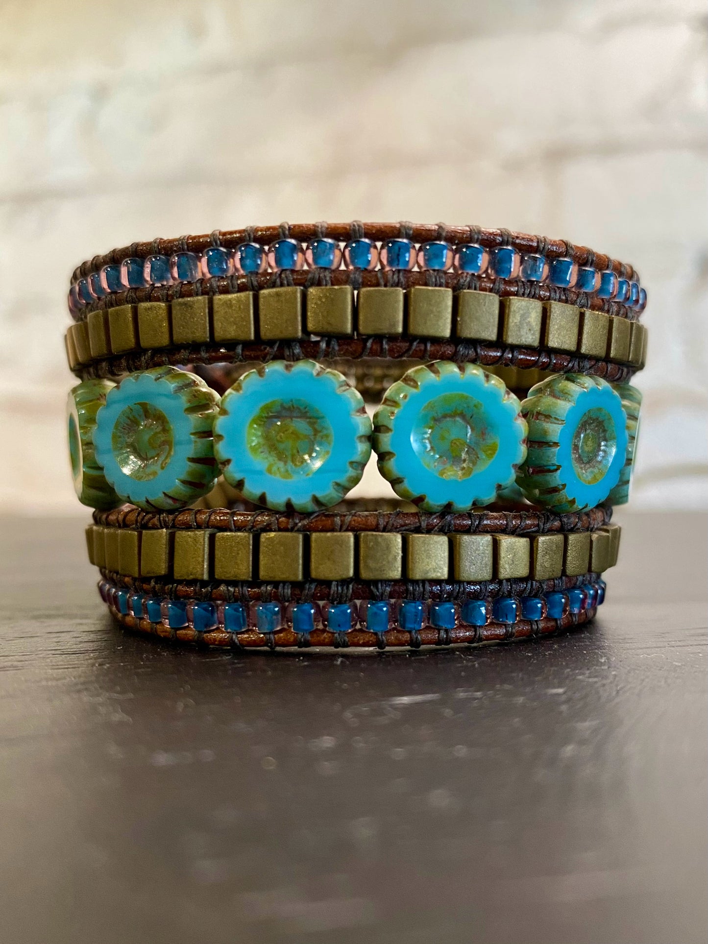 Cuff bracelet, blue daisy, 5 beaded rows, blue/bronze
