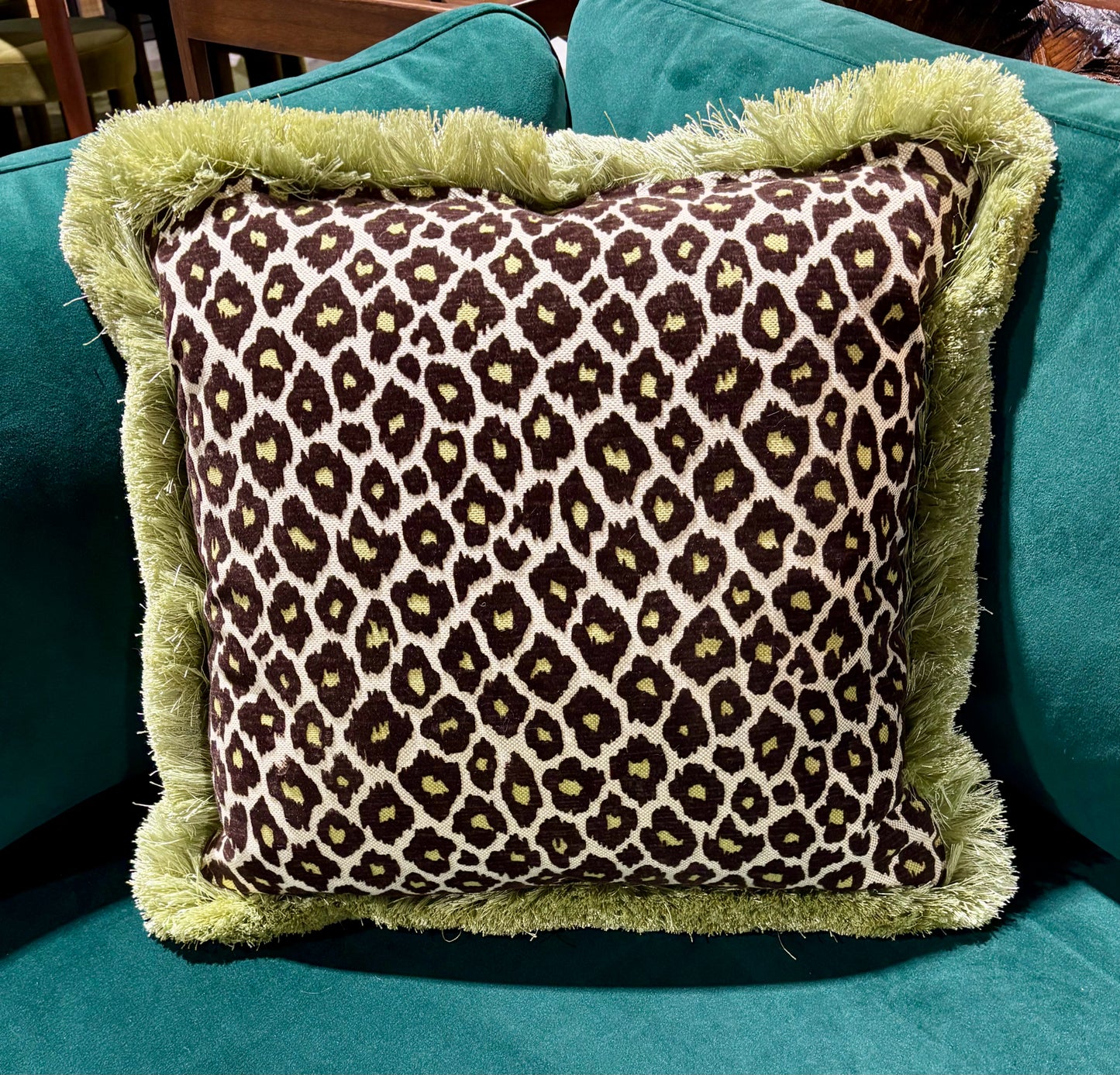 Leopard pillow, green fringe 21" x 21"