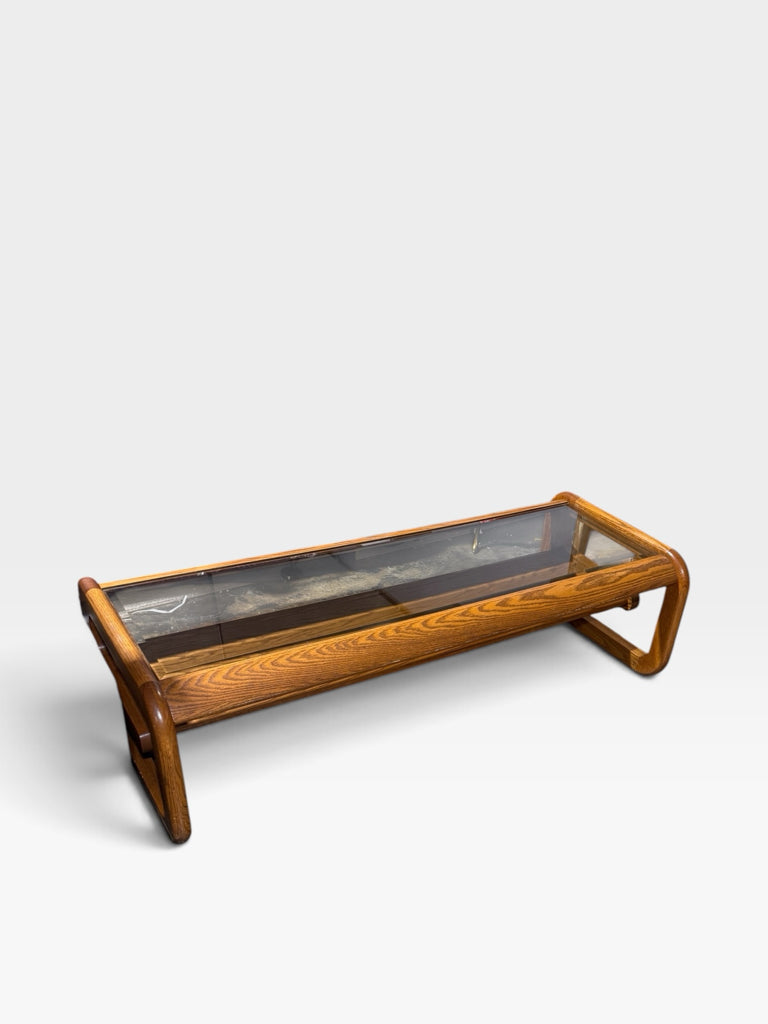 VTG 1970s Modernist coffee table w/sled base, oak/smoked beveled glass