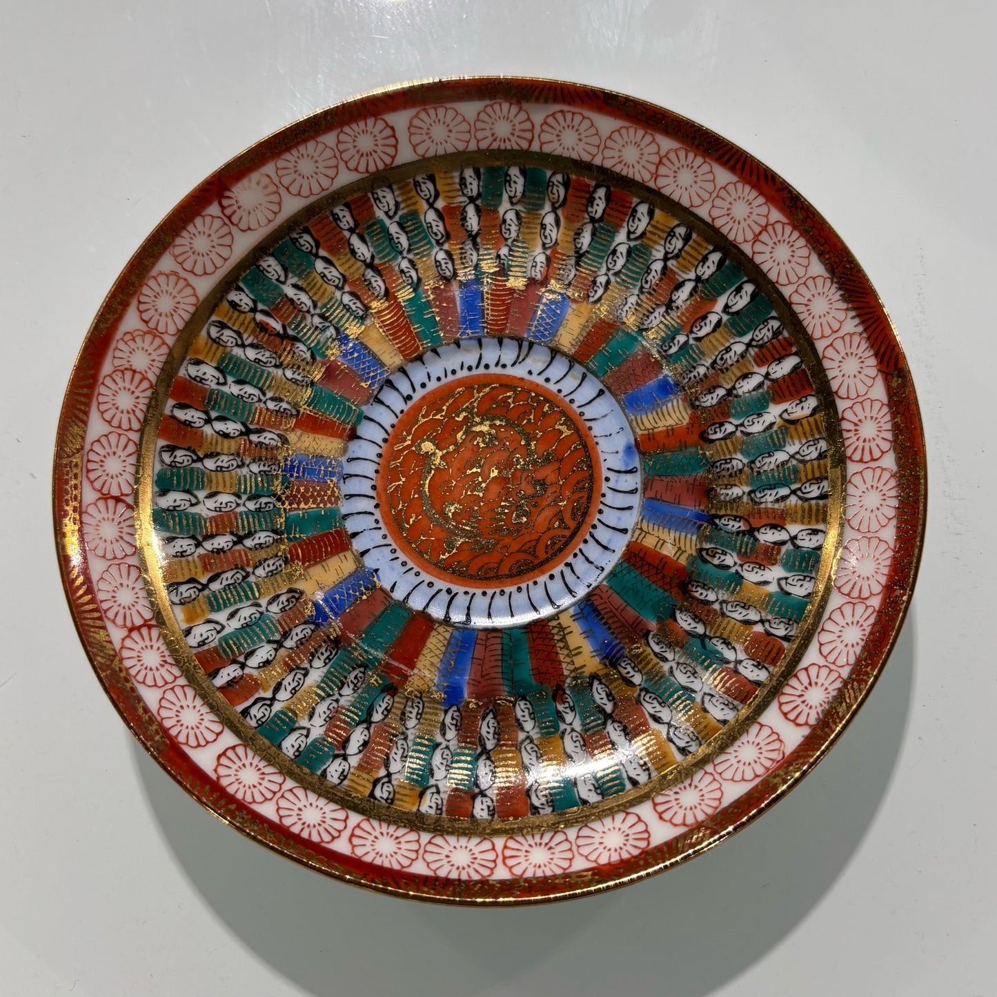 Japanese "Thousand Faces" Plate 5.5" D x .75" H