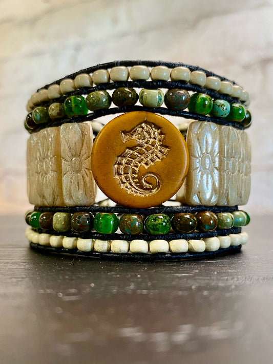 Cuff bracelet, seahorse/orange, 5 beaded rows, cream/orange/green