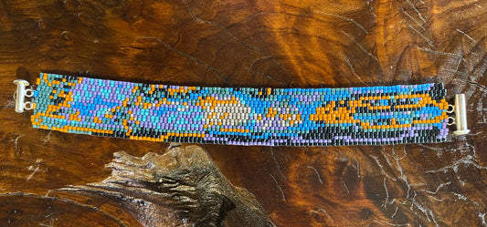 Peyote stitch bracelet, "Oil Slick", blue/purple/black/rust, .9"W x 7"L