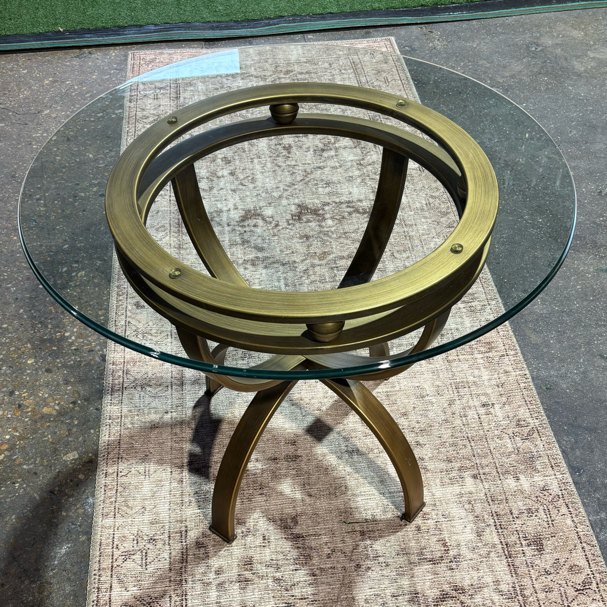 Glass top/antiqued brass finish base side table