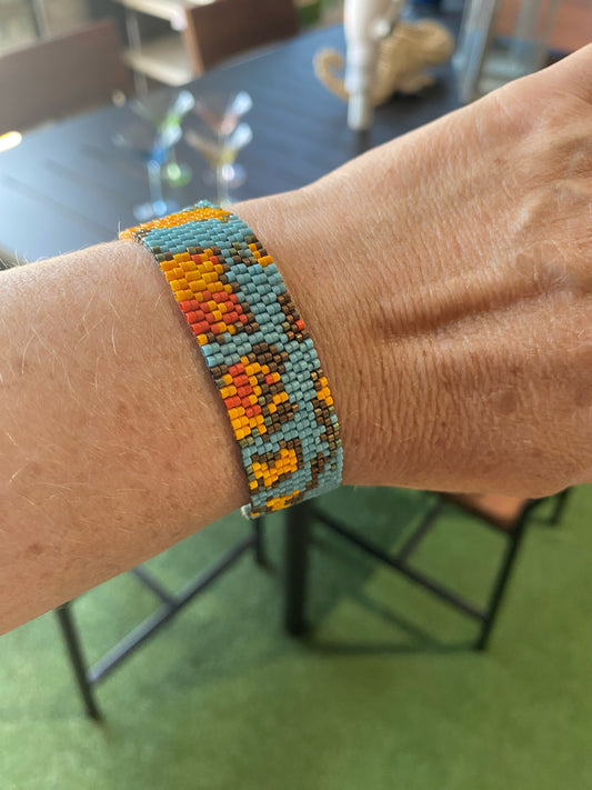 Peyote stitch bracelet, "Skinny12", blue/yellow/orange, .75"W x 7"L