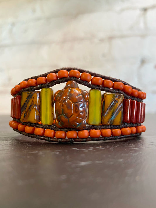 Cuff bracelet,turtle, 3 beaded rows, red/orange/yellow