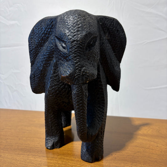Hand carved elephant figurine, 8"W x 5"D x 9.5" H