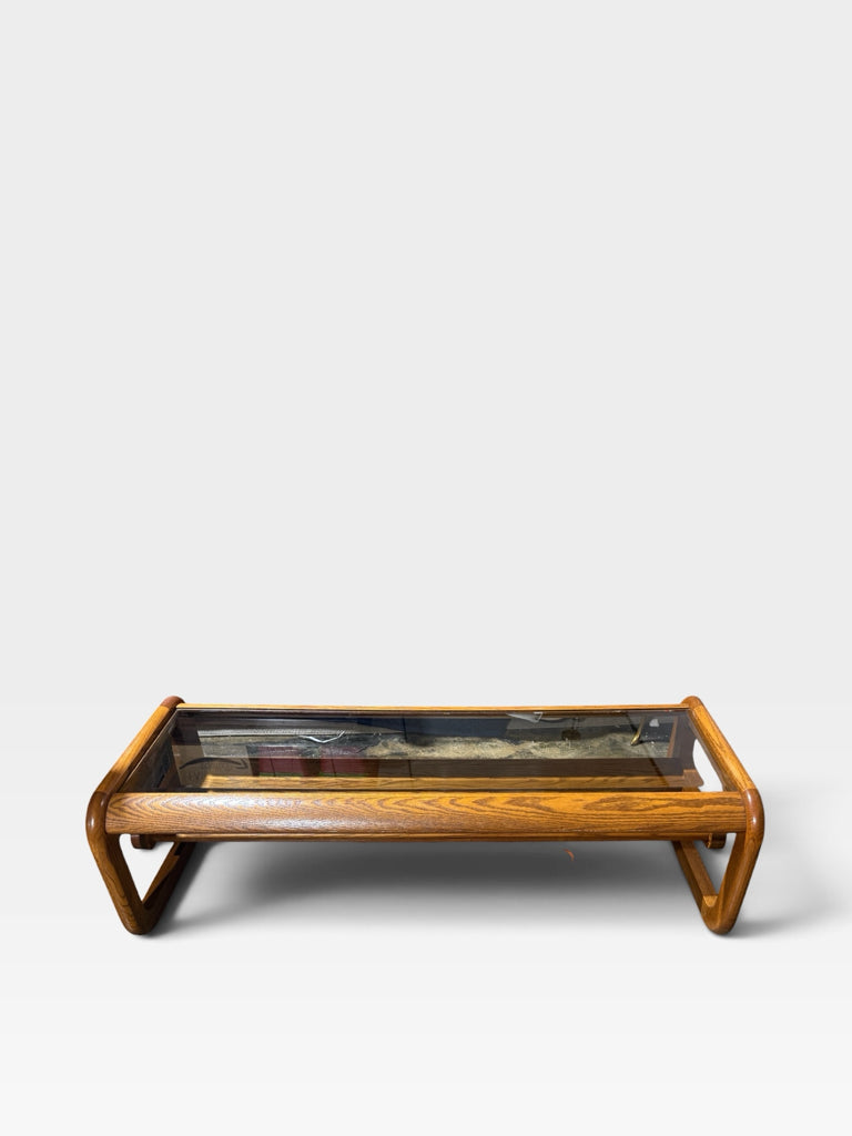 VTG 1970s Modernist coffee table w/sled base, oak/smoked beveled glass