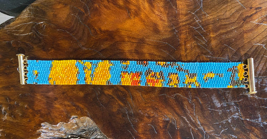Peyote stitch bracelet, "Skinny12", blue/yellow/orange, .75"W x 7"L