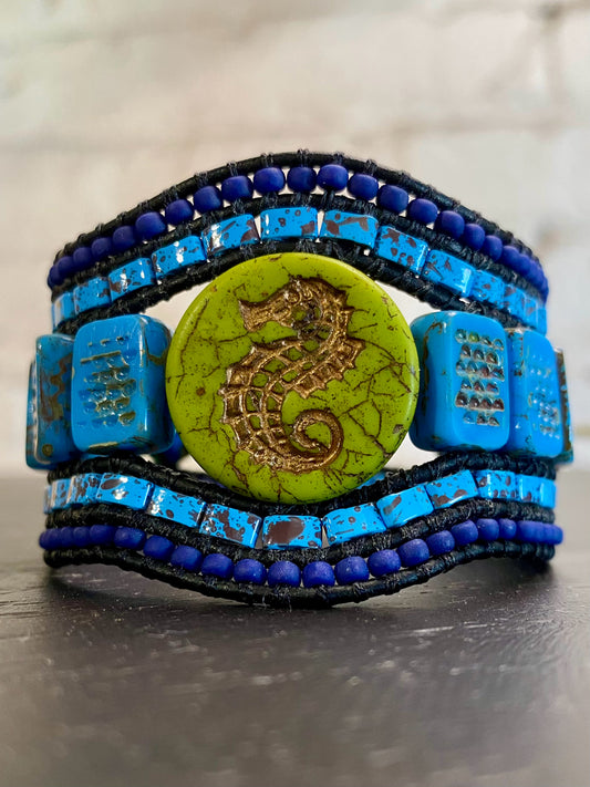 Cuff bracelet,seahorse/green, 5 beaded rows, blues/greens