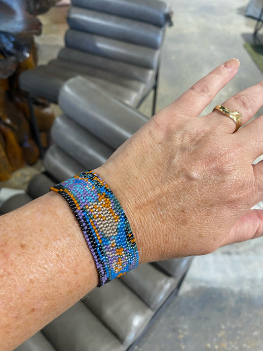Peyote stitch bracelet, "Oil Slick", blue/purple/black/rust, .9"W x 7"L