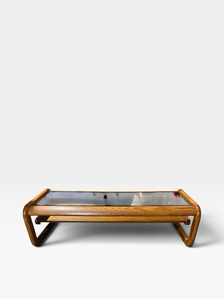 VTG 1970s Modernist coffee table w/sled base, oak/smoked beveled glass