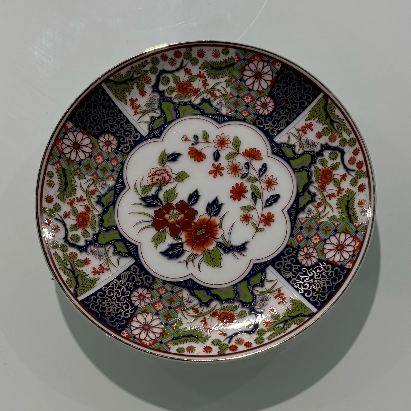 Imari Plate blue,green,gold 6.25" D x .5" H