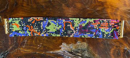 Peyote stitch bracelet, "Lucy", black/green/orange, 1"W x 7"L