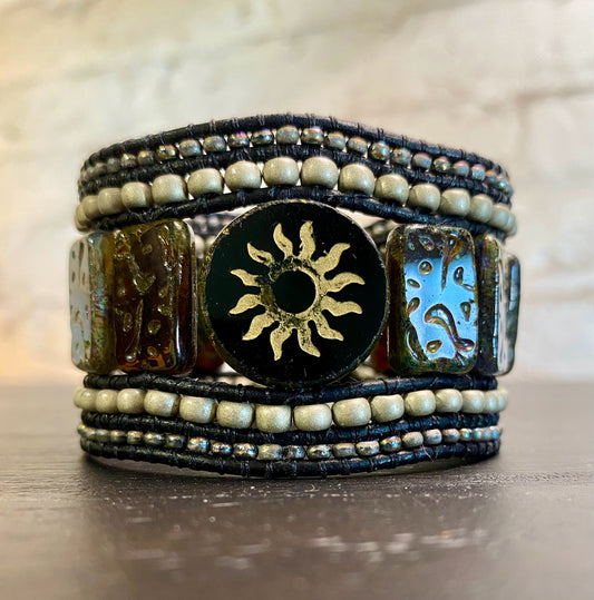 Cuff bracelet, black sun, 5 beaded rows, black