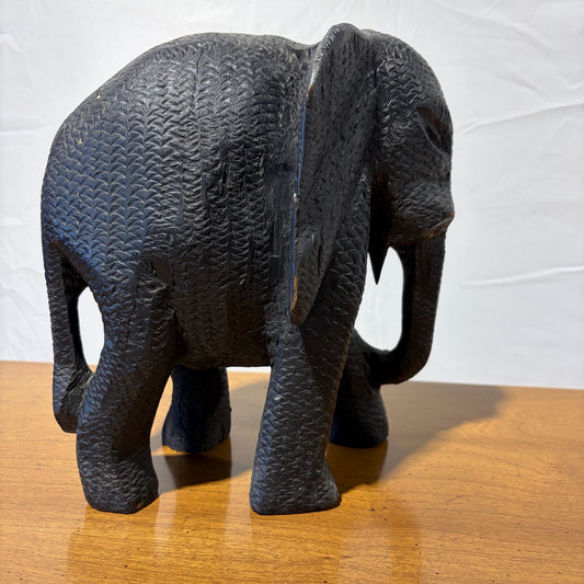Hand carved elephant figurine, 8"W x 5"D x 9.5" H